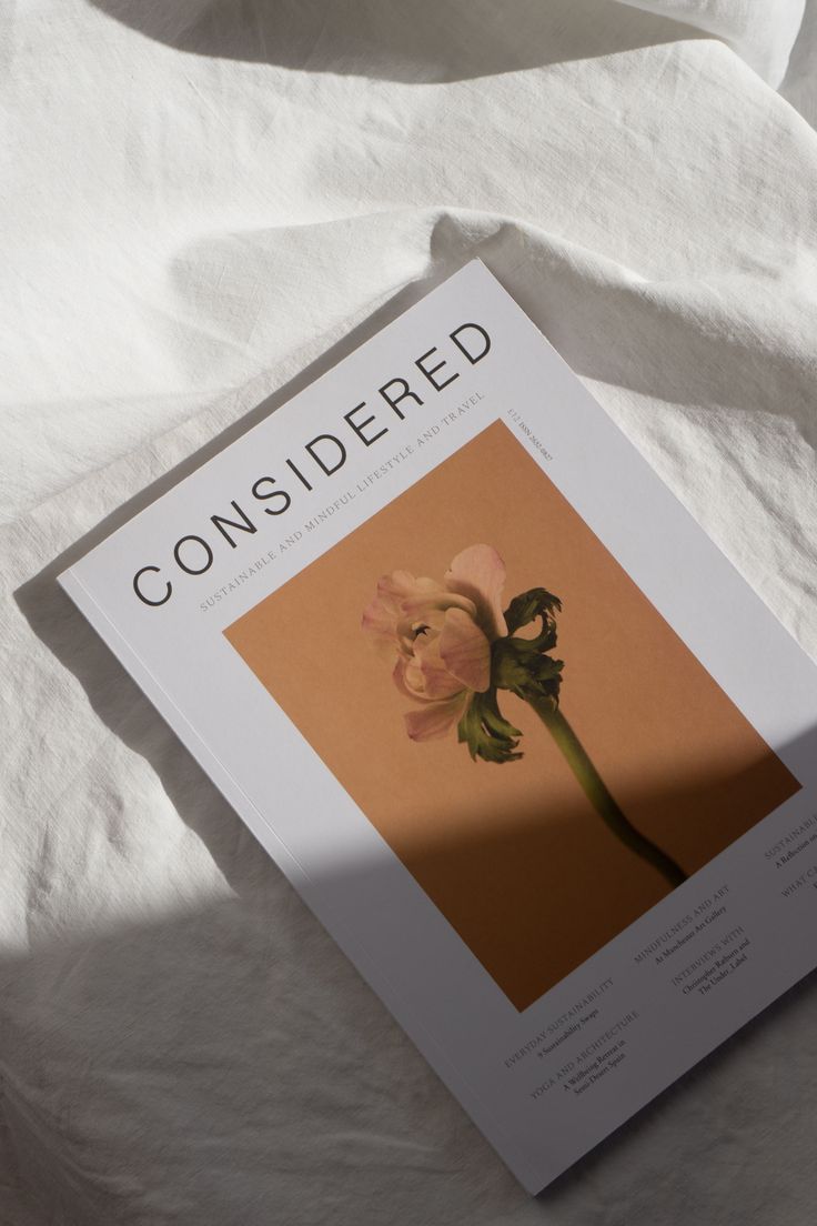 CONSIDERED ~ A Magazine for Sustainable Mindful Lifestyle Travel RG Daily Considered magazine on a white sheet featuring a flower cover, promoting sustainable lifestyles and travel. | Sky Rye Design Considered magazine on a white sheet featuring a flower cover, promoting sustainable lifestyles and travel.