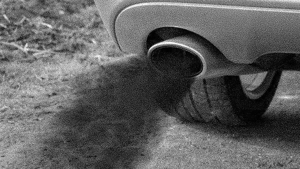 Car silencer Car exhaust emitting black smoke, highlighting vehicle pollution and environmental concerns. | Sky Rye Design Car exhaust emitting black smoke, highlighting vehicle pollution and environmental concerns.
