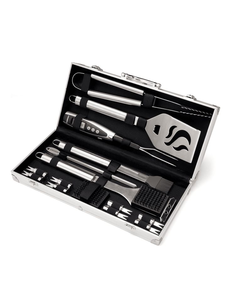 Stainless steel BBQ grill tool set in its open case, featuring spatula, tongs, and more. Perfect for outdoor cooking.