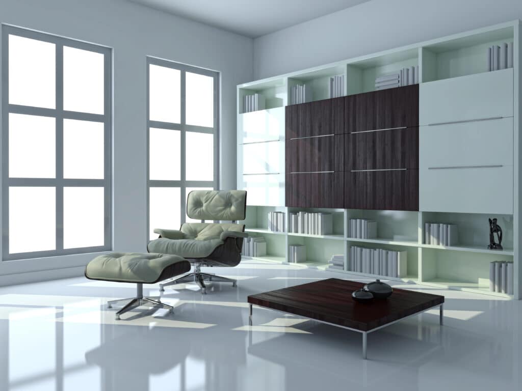 Modern living room with stylish lounger, bookshelves, and large windows for natural light. Minimalist interior design.