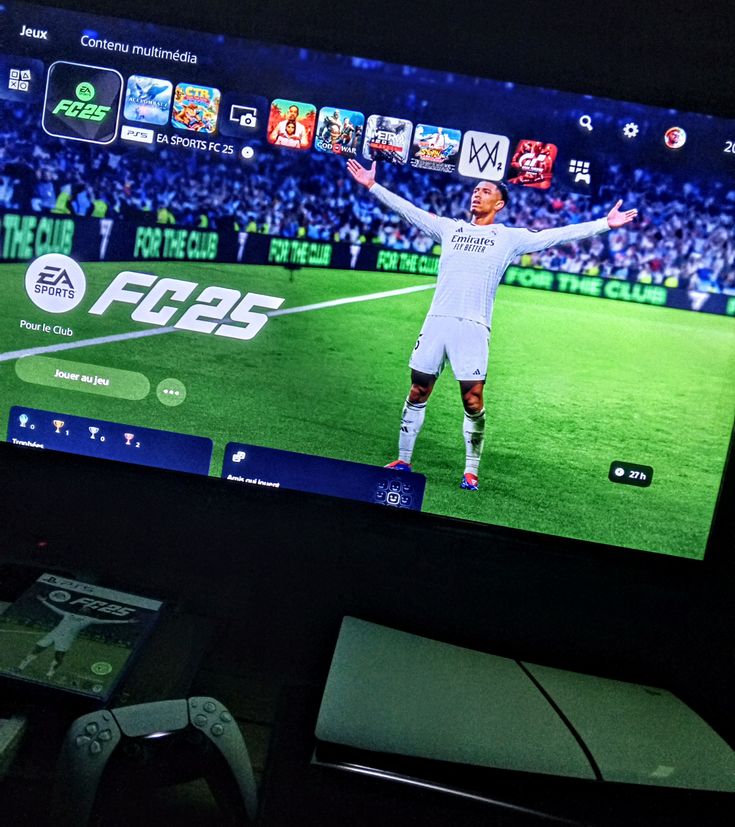 EA Sports FC 25 game screen on TV with console and controller nearby.