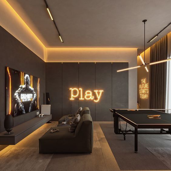 Modern gaming room with neon lighting, featuring a sofa, large TV, and a table tennis setup.
