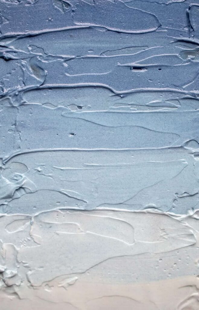 Textured abstract art in blue and white shades, resembling ocean waves and sky gradients for a calming visual effect.