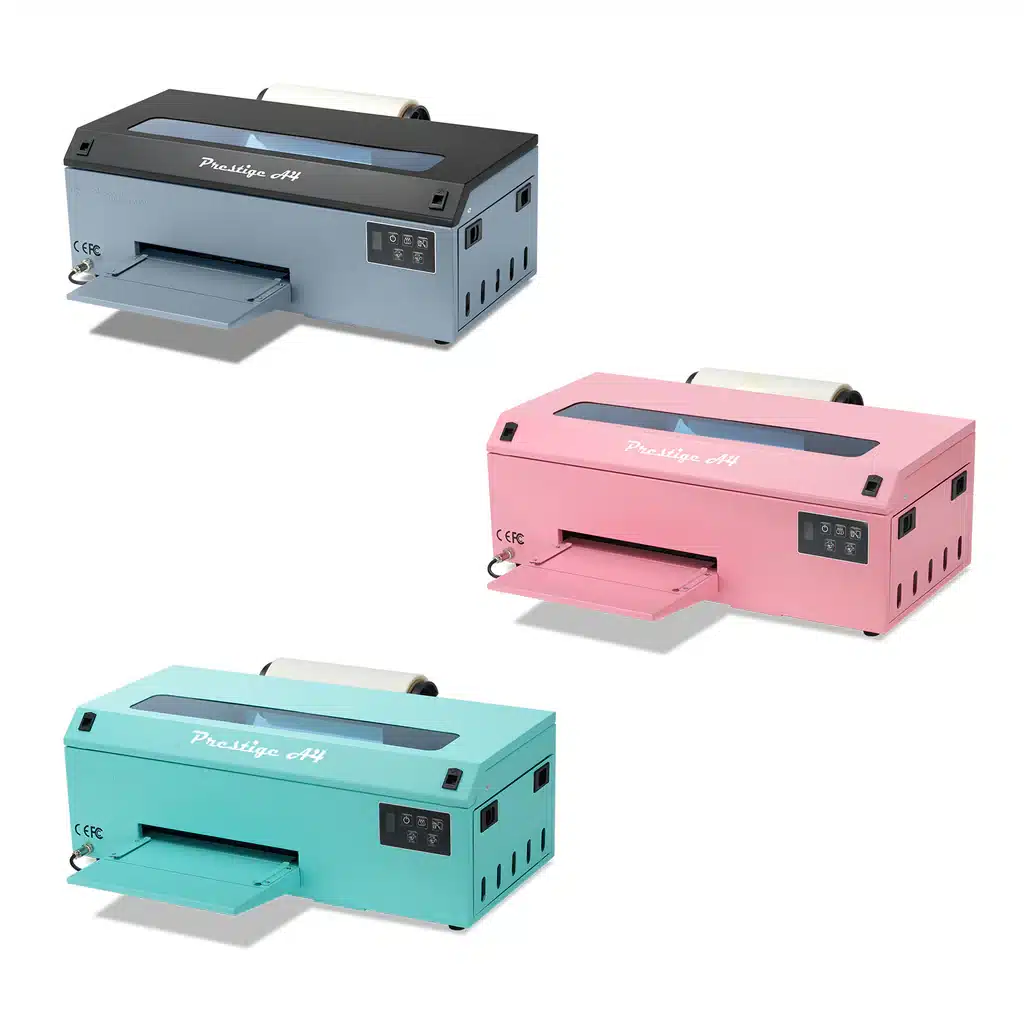 Three colorful Prestige A4 printers in gray, pink, and teal, side-by-side, showcasing different design options.