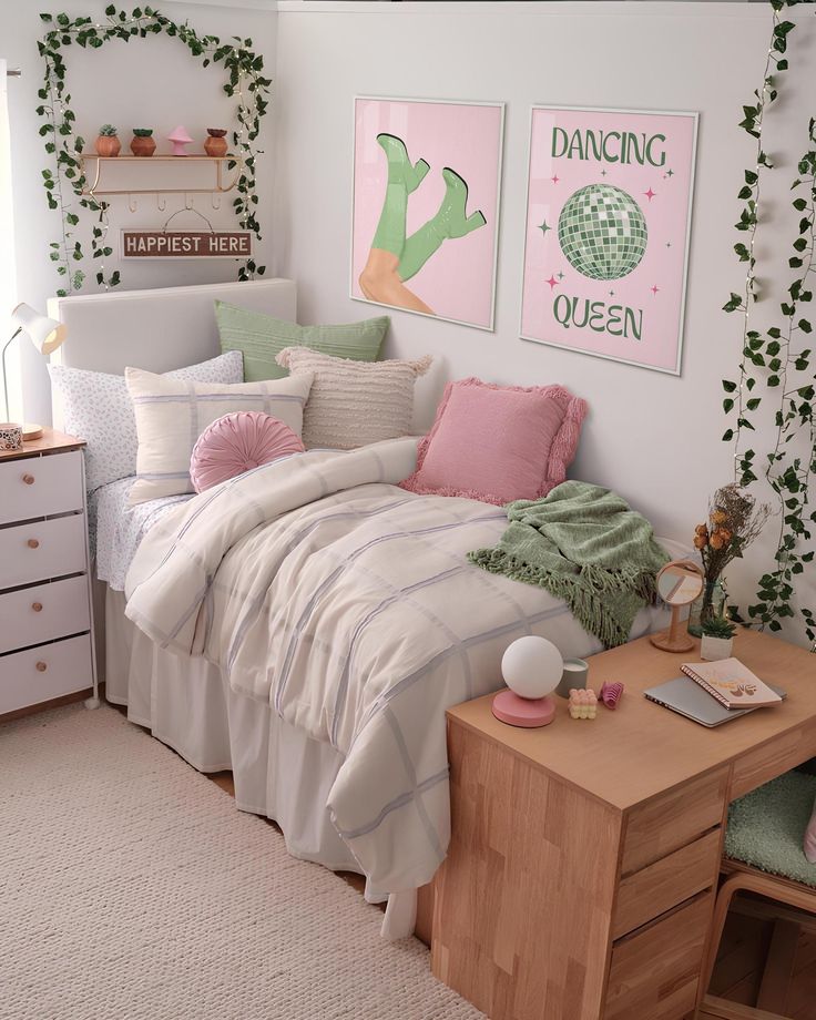 Cozy bedroom decor with pink and green accents, leafy vines, and Dancing Queen wall art. Warm, inviting atmosphere.