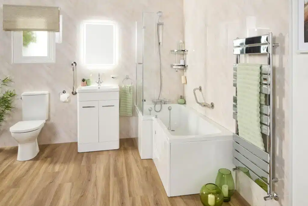 Modern bathroom with bathtub, vanity, and accessories on wooden floor, evoking elegance and functionality.
