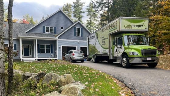 The Benefits of Professional Packing Services for Your Move Moving truck parked outside a suburban home amid trees, ready for a moving day with Stairhopper Movers. | Sky Rye Design Moving truck parked outside a suburban home amid trees, ready for a moving day with Stairhopper Movers.