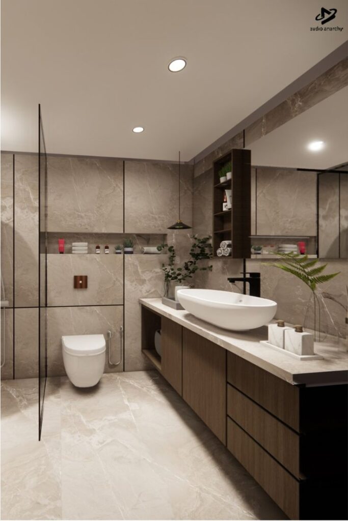Modern bathroom with elegant marble tiles, vessel sink, and sleek fixtures for a luxurious and contemporary design.