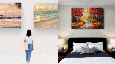 Person admiring beach paintings, bedroom with vibrant autumn artwork above bed.