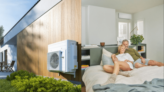 Couple relaxing indoors with an efficient heat pump system installed at home for energy-saving comfort.