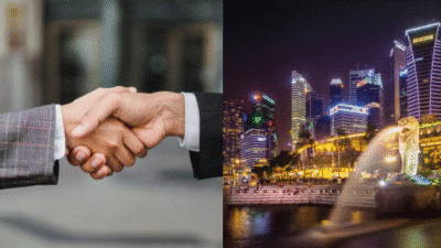 Business handshake and Singapore city skyline at night, symbolizing global partnership and growth.