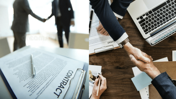 Business professionals shaking hands over a contract and laptop, symbolizing successful partnership and agreement.