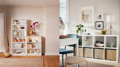 Modern home decor with white shelving units, plants, and framed art in a cozy living space.