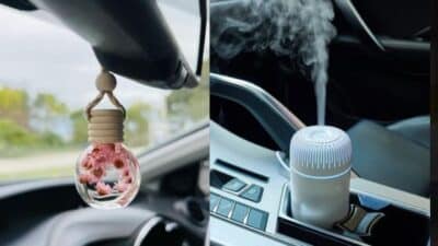 Car interior with hanging air freshener and car diffuser for a fresh and fragrant driving experience.