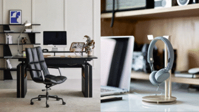 Modern home office with ergonomic chair, desk, computer, and stylish headphones on stand.