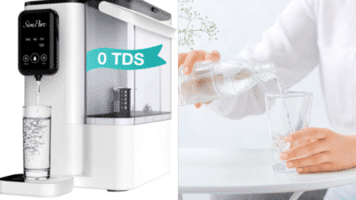 Water purifier with 0 TDS dispensing into glass, person pouring clear water from bottle into glass on table.