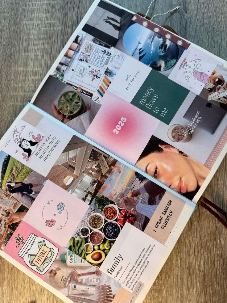 Open journal with colorful collage, inspiring quotes, healthy lifestyle images, and future goals planning on a wooden table.