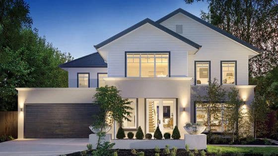 What Should Look for in a Layout Before Buying Modern two-story house with large windows, illuminated at dusk, surrounded by trees and a manicured garden. | Sky Rye Design Modern two-story house with large windows, illuminated at dusk, surrounded by trees and a manicured garden.