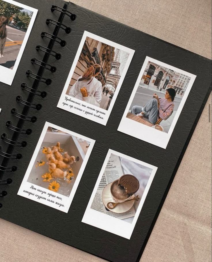 Photo album with travel and lifestyle Polaroids on a black spiral-bound page.
