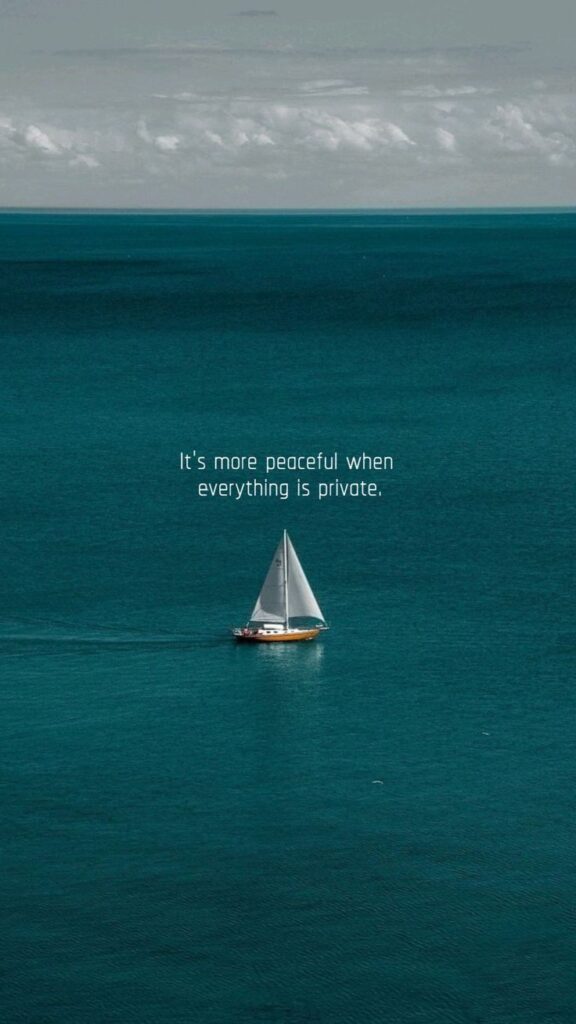 Sailboat on serene ocean, quote overlay: It's more peaceful when everything is private, peaceful seascape.