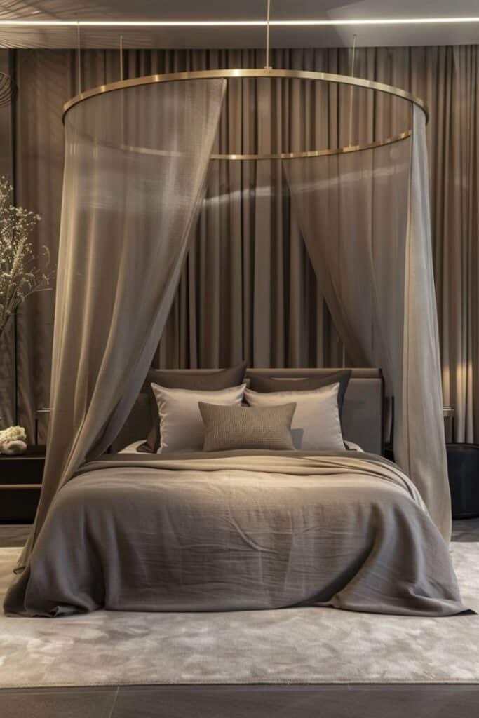 Modern bedroom with gray canopy bed, elegant bedding, and subtle lighting for a cozy, sophisticated ambiance.