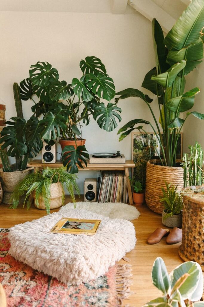 Cozy living room with indoor plants, vinyl records, and a shaggy rug creating a serene, bohemian atmosphere.