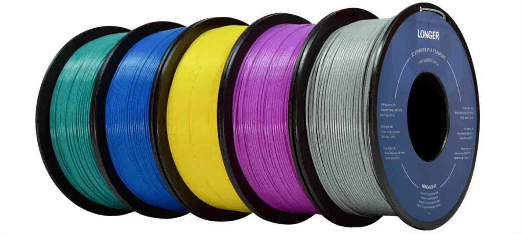Colorful 3D printer filament spools in green, blue, yellow, pink, gray; essential for versatile printing projects.