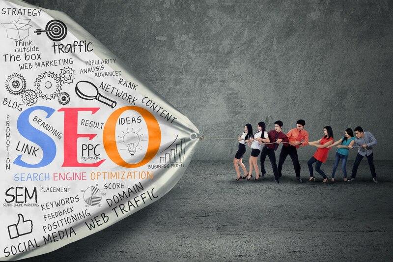 unnamed Group pulling SEO marketing concepts, symbolizing teamwork and digital strategy for enhancing online visibility. | Sky Rye Design Group pulling SEO marketing concepts, symbolizing teamwork and digital strategy for enhancing online visibility.