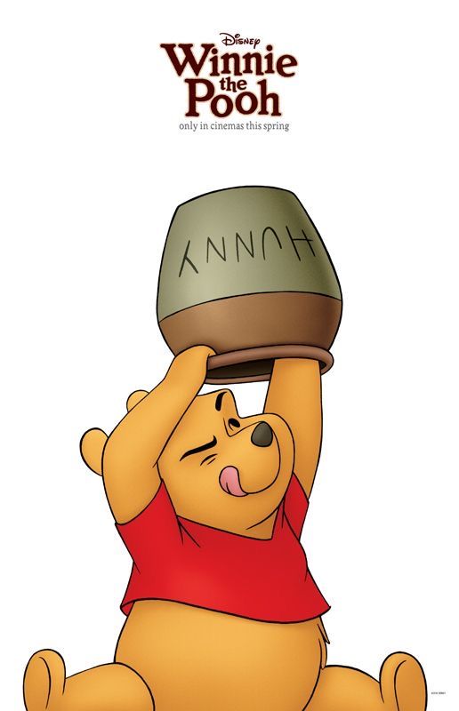 Winnie the Pooh holding a honey pot with delight, under Winnie the Pooh movie poster text.