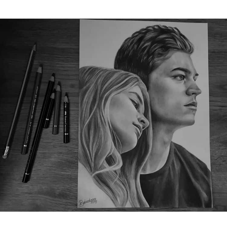Pencil drawing of a couple with heads close; art supplies beside, showcasing realistic portrait skills.