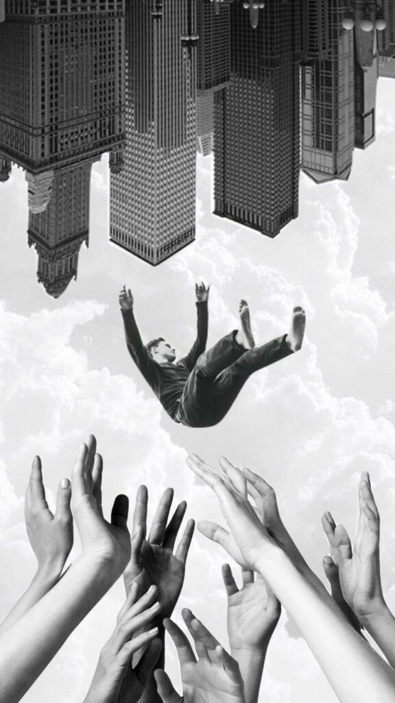 Surreal image of a person falling amidst reaching hands and an upside-down city skyline in the clouds.