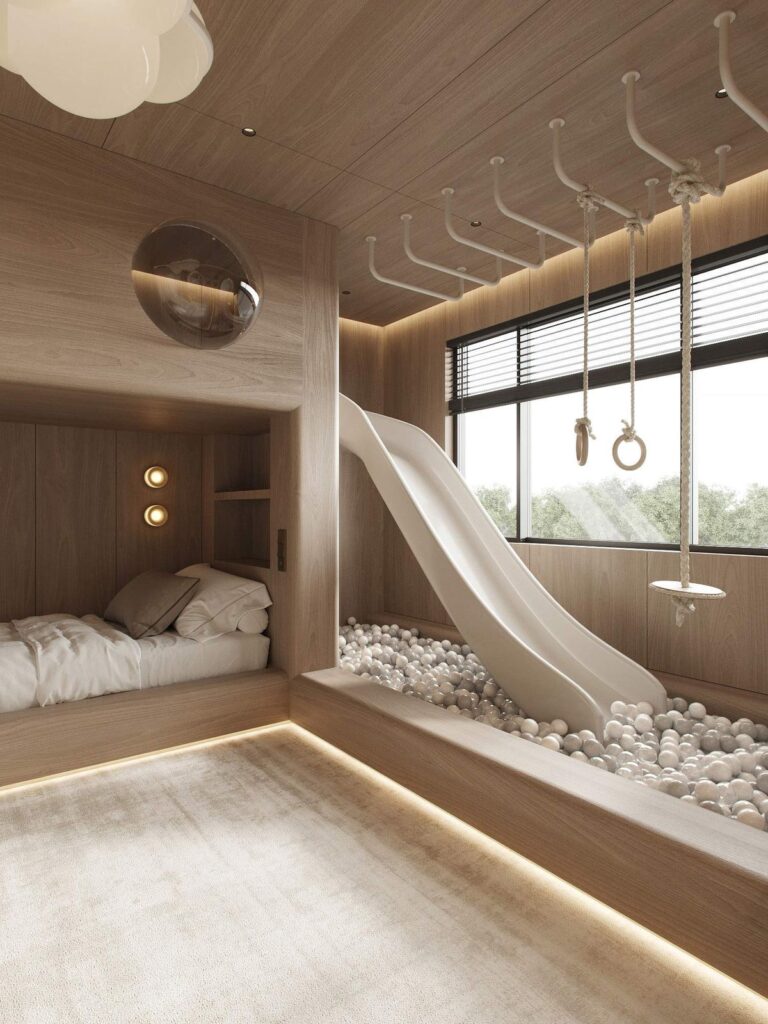 31eae921cdd4347402ed636323e0f2b4 Children's room with a slide, ball pit, and monkey bars, featuring wooden accents and cozy lighting. | Sky Rye Design Children's room with a slide, ball pit, and monkey bars, featuring wooden accents and cozy lighting.