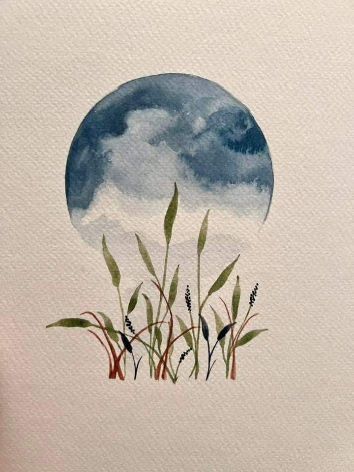 Watercolor painting of a blue circle above green plants with black seeds on textured paper, suggesting nature and serenity.