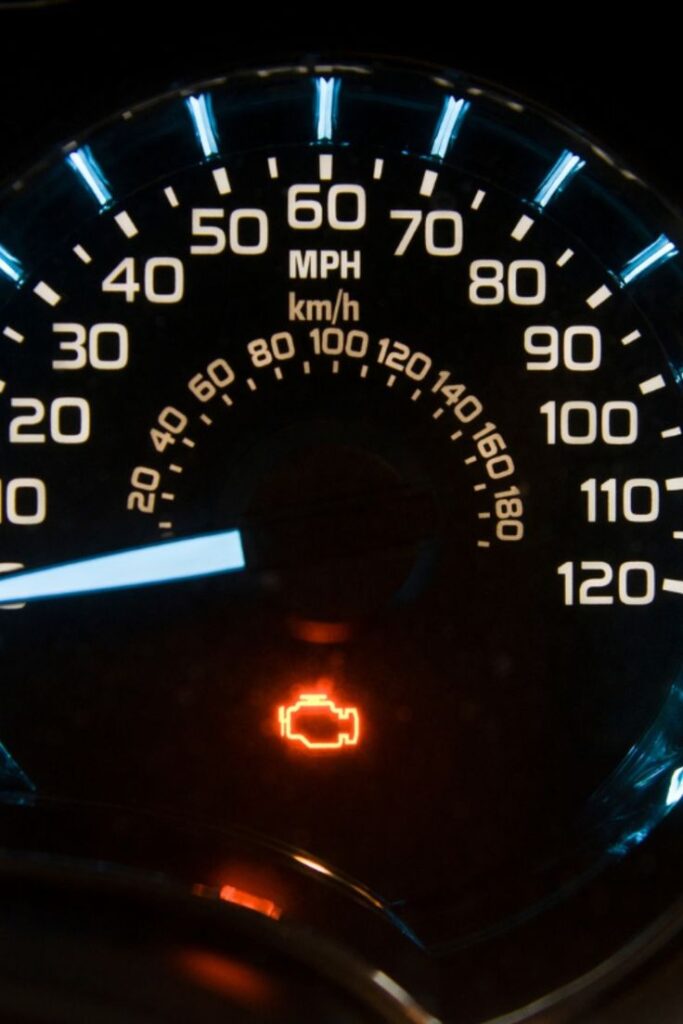 5 reasons engine light is on Close-up of a car speedometer with a glowing check engine light indicator, signaling a potential vehicle issue. | Sky Rye Design Close-up of a car speedometer with a glowing check engine light indicator, signaling a potential vehicle issue.