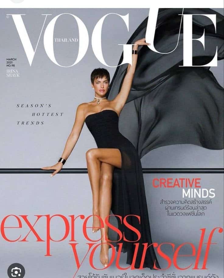 Fashion magazine cover featuring a model in a stylish black dress, highlighting season's hottest trends.