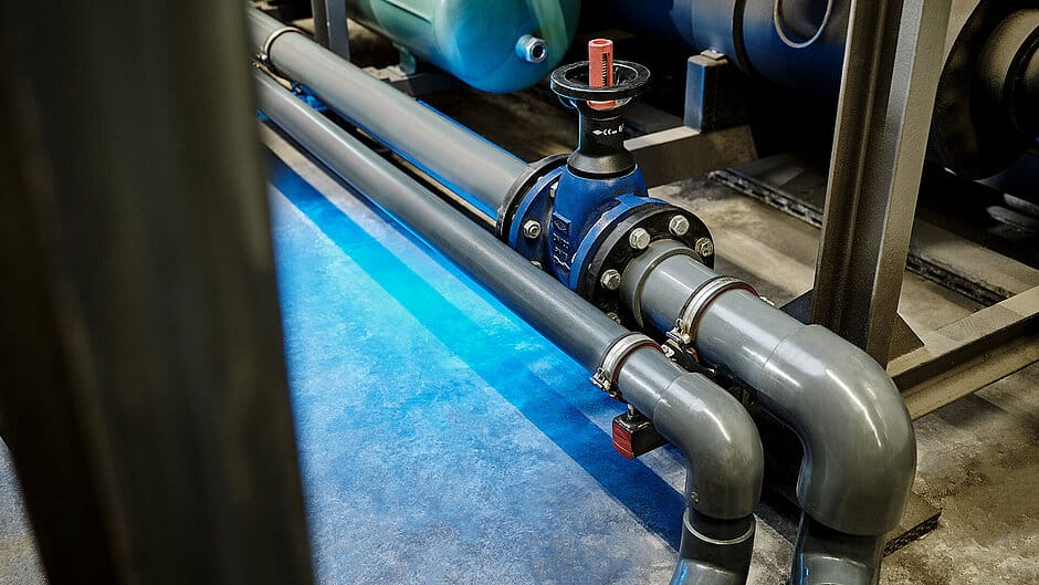 Industrial piping system with valves and connections in a facility.
