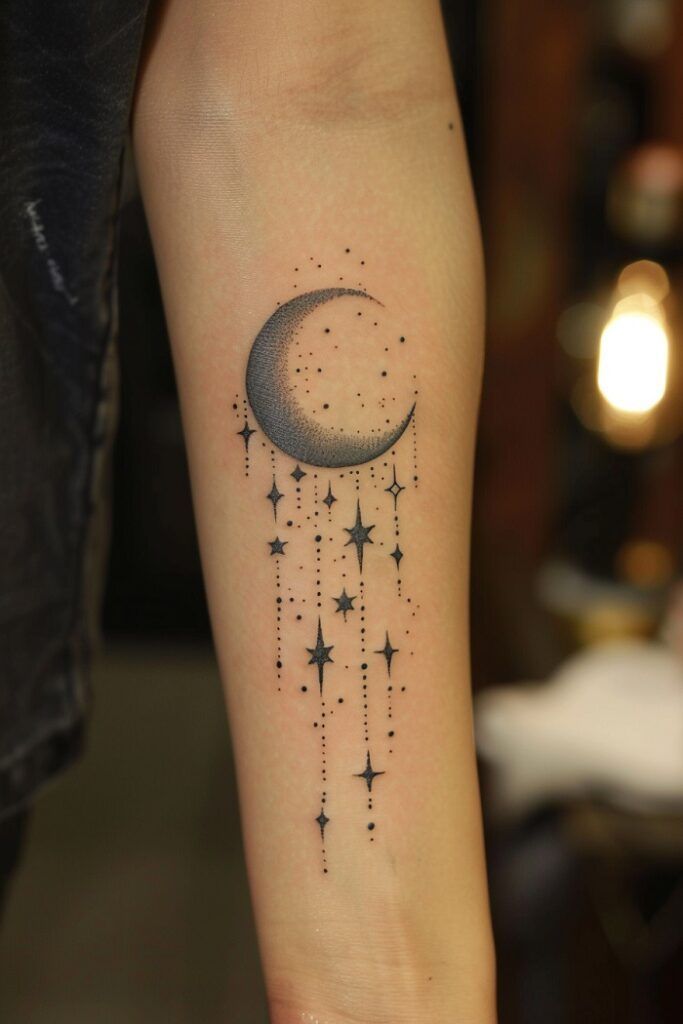 Minimalist arm tattoo of a crescent moon and stars with dot shading on a forearm, blending elegance and simplicity.