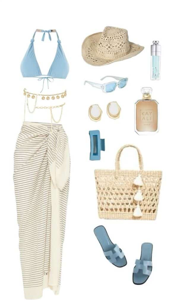 Beach outfit with blue bikini, striped sarong, straw hat, earrings, sunglasses, perfume, sandals, and woven bag.