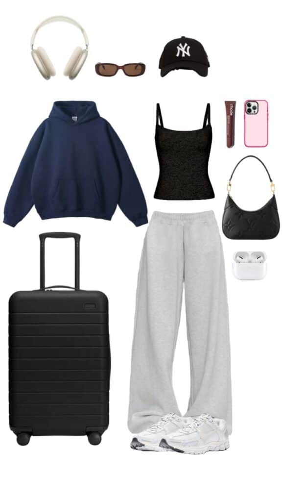 Trendy travel essentials: headphones, sunglasses, cap, hoodie, tank, pants, sneakers, suitcase, purse, AirPods, phone case.