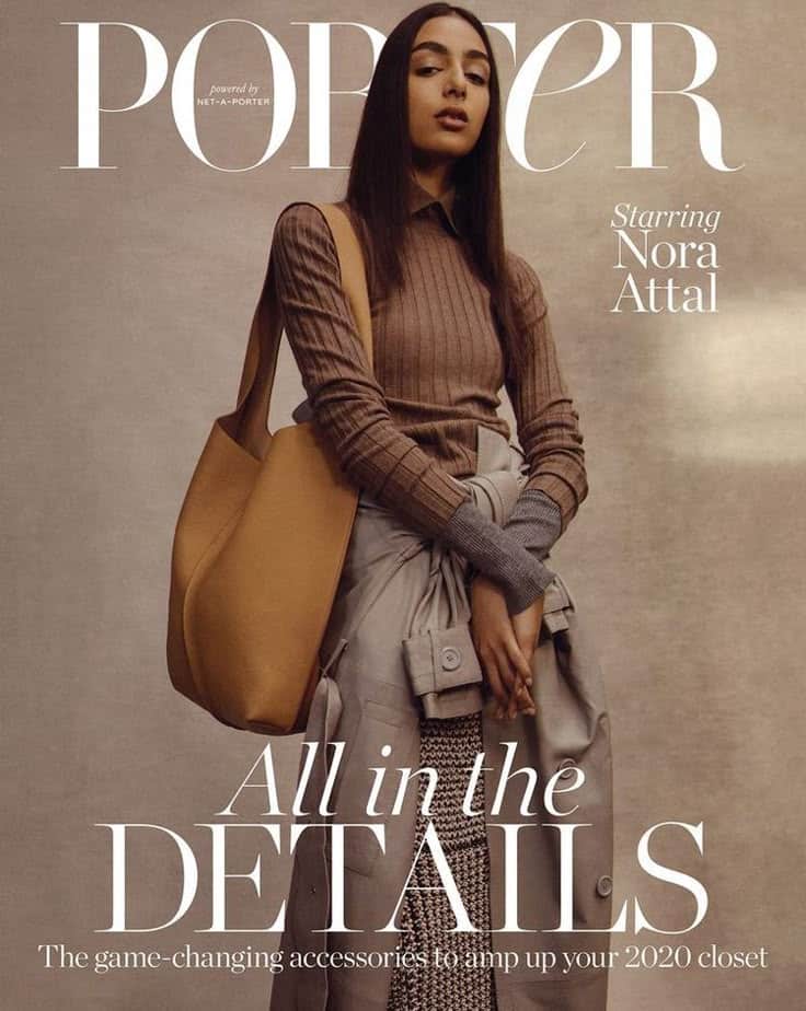 Fashionable woman in layers with a brown bag on Porter magazine cover, showcasing chic accessories for 2020.