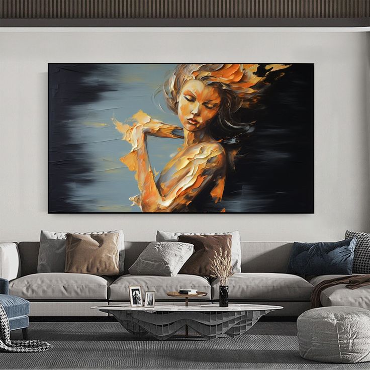 Abstract fiery woman painting on canvas above modern living room sofa.