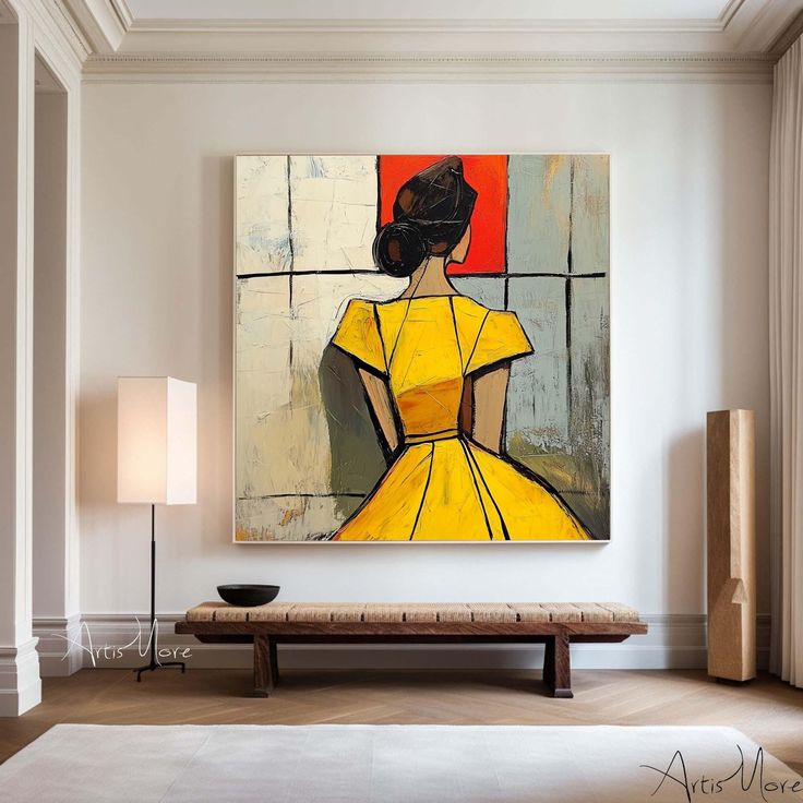 Abstract painting of a woman in a yellow dress, displayed in a modern living room above a wooden bench.