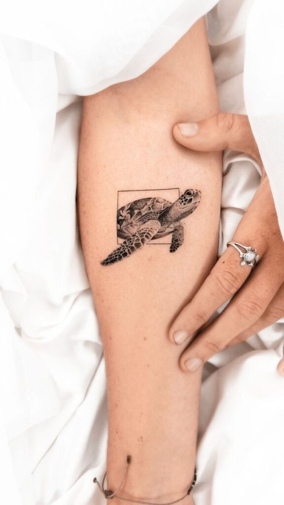 TurtleTortuga _ Small Tattoo Turtle tattoo on forearm with intricate details, hands nearby showing a ring and bracelet, on a white background. | Sky Rye Design Turtle tattoo on forearm with intricate details, hands nearby showing a ring and bracelet, on a white background.