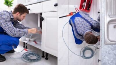 Plumber fixing kitchen sink with tools, cables on white floor.
