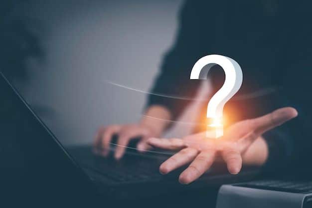 Person holding a 3D question mark hologram over a laptop, symbolizing inquiry and technology.