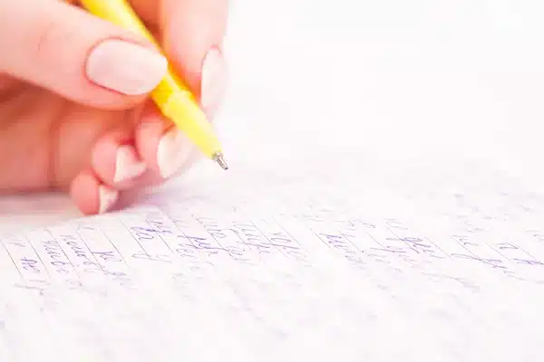 depositphotos_35562917-stock-photo-business-woman-writing-with-pen | Sky Rye Design