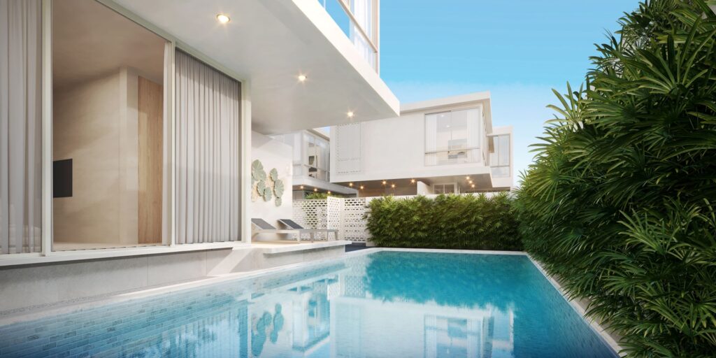 elite-hillside-villas-id2323-swimming-pool-2 Modern villa courtyard with serene blue pool, lush greenery, and sleek architectural design under a clear sky. | Sky Rye Design Modern villa courtyard with serene blue pool, lush greenery, and sleek architectural design under a clear sky.