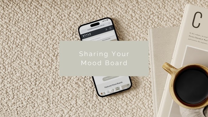Smartphone on woven surface with Sharing Your Mood Board text, next to coffee and book for a creative morning setup.