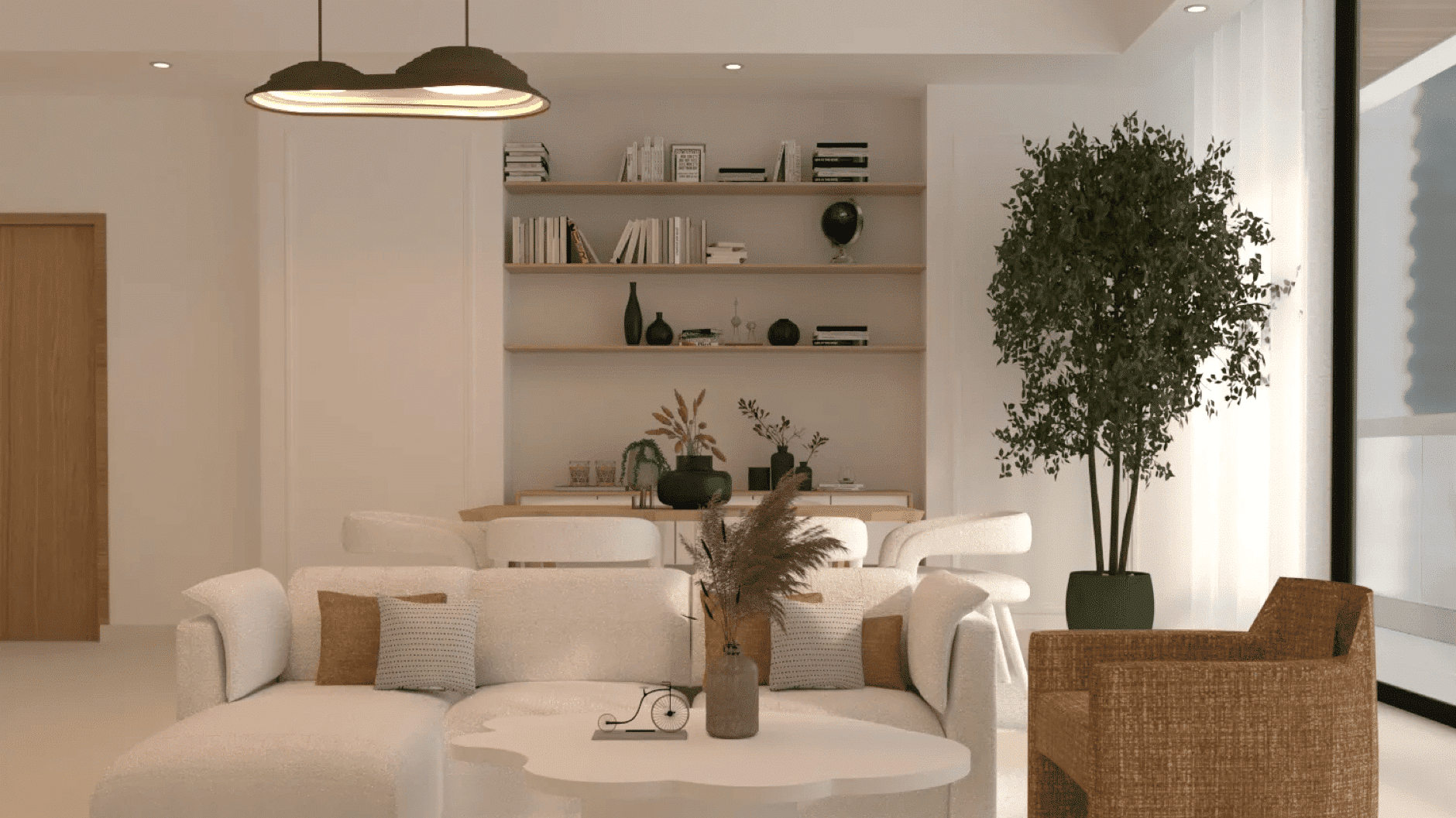 Modern living room with white sofa, decorative pillows, round coffee table, and indoor plant for a cozy ambiance.
