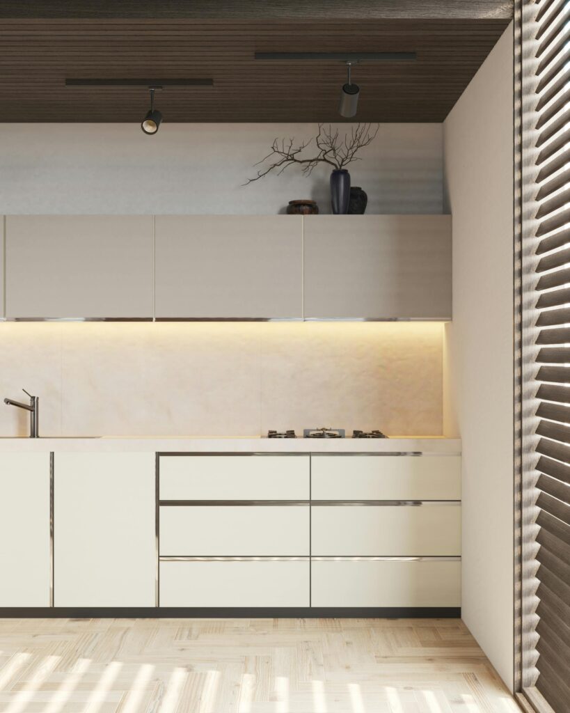 Modern minimalist kitchen with sleek cabinets, built-in stove, wood accents, and soft lighting.